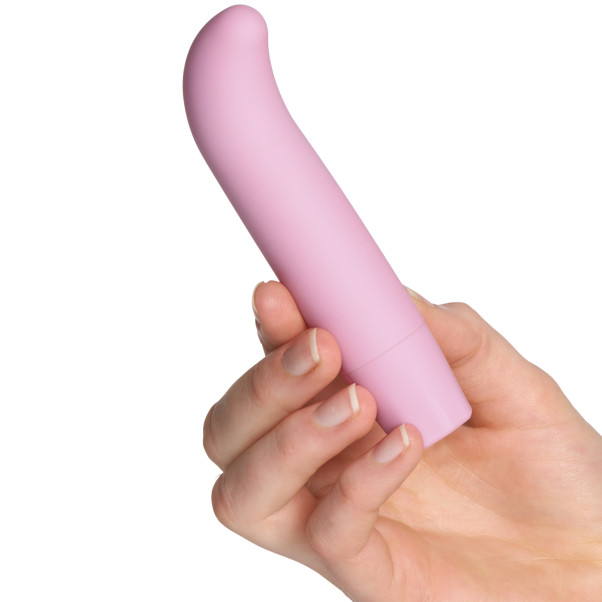 Baseks Curve G-punkts Mini Vibrator Produktbillede med hånd 50