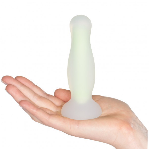 Baseks Glow in the Dark Gul Medium Anal Dildo Produktbillede med hånd 50
