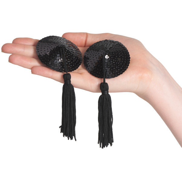 baseks Runde Sorte Nipple Covers med Kvaster Produktbillede med hånd 50