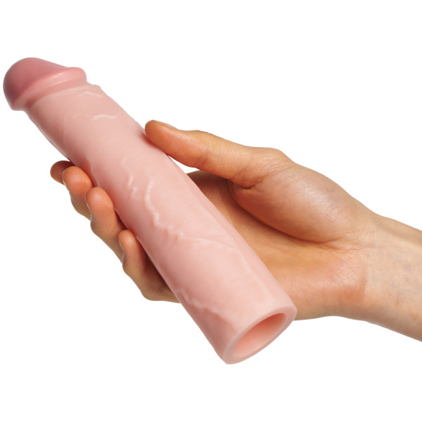 Fantasy X-tensions Elite Light Penis Sleeve Extension Produktbillede med hånd 50
